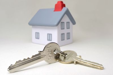 buying a house - cgi house with keys in forefront of image
